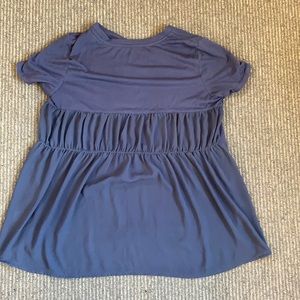 Dainty blue top with sheer layered back